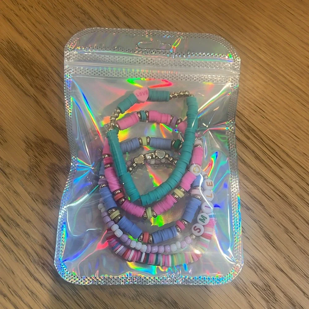 Cheerful set of brightly colored‎ beaded elastic friendship bracelets